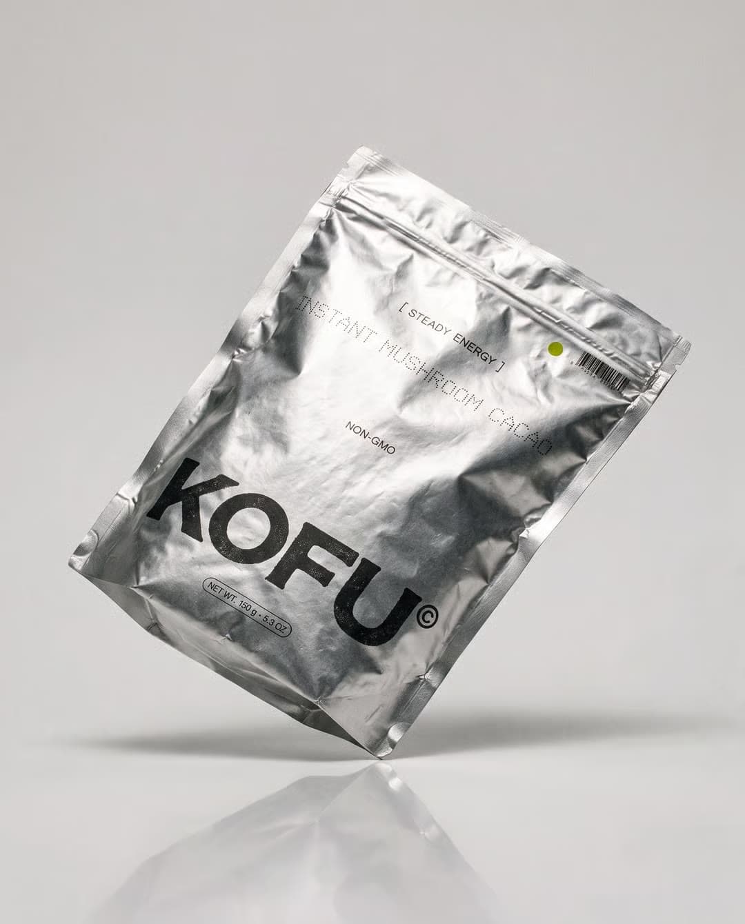 A silver Kofu pouch on a clean white studio background